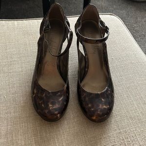 Faux pat and leather pumps